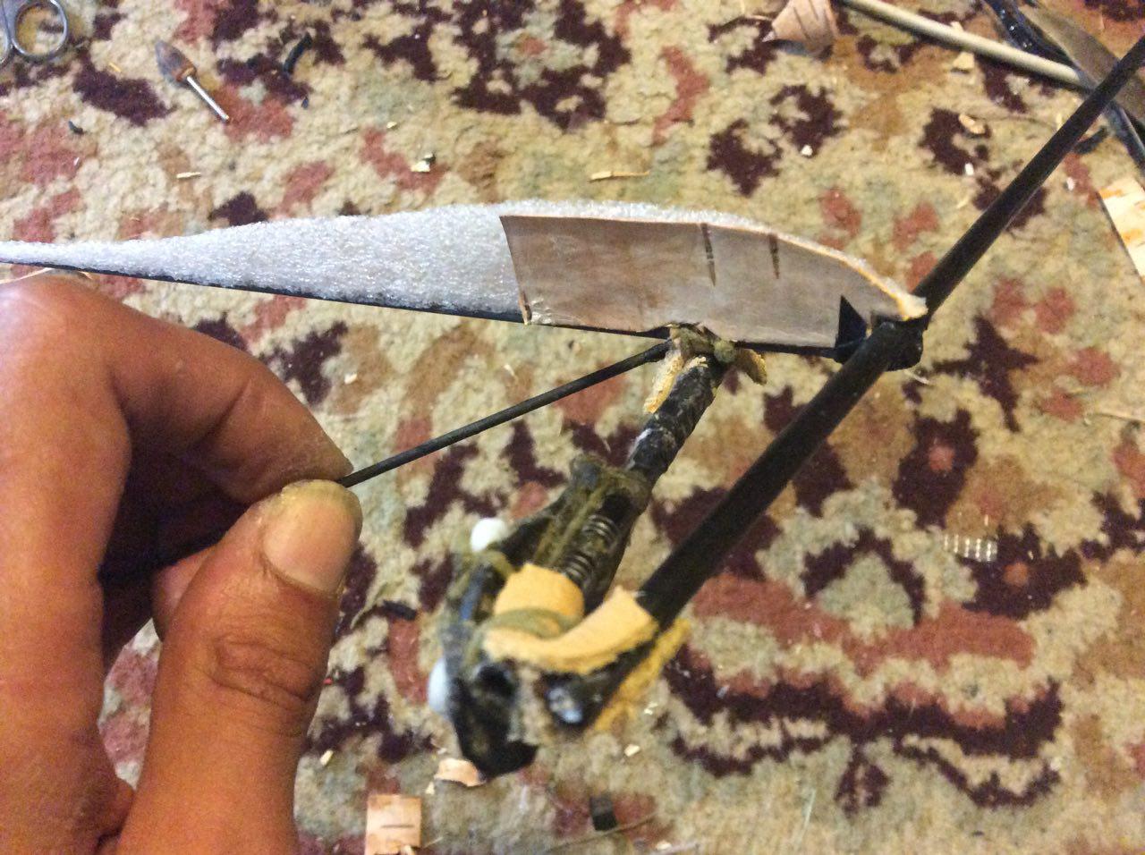 Leather hinges and birch skin used for flexible wing framework